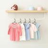imageHOUSE DAY Baby Hangers 100 Pack  Durable Plastic Infant ampamp Kids Clothes Hangers Thin Compact SpaceSaving Design for NurseryChildrens Closet Toddler Small Hangers White InfantBabyToddlerKidsBlack