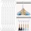 imageHOUSE DAY Closet Organizers and Storage 12 Pack College Dorm Room Essentials Multifunctional Organizer Magic Space Saving Hangers with 5 Holes Storage Organization for Wardrobe ClosetWhite