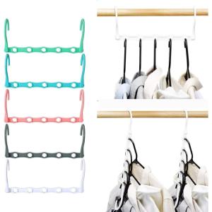 imageHOUSE DAY Closet Organizers and Storage 12 Pack College Dorm Room Essentials Multifunctional Organizer Magic Space Saving Hangers with 5 Holes Storage Organization for Wardrobe ClosetMixed Color