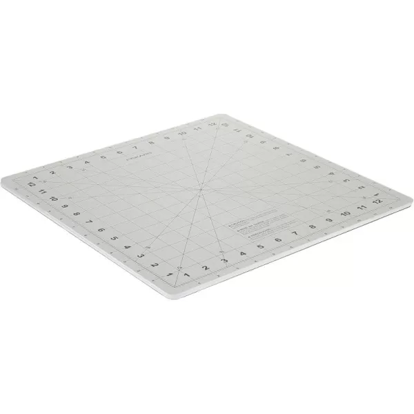 imageFiskars Rotating Cutting Mat  14quot x 14quot Grid to Cut Fabric Squares Easily  Perfect for Quilting Sewing and Craft Projects  SelfHealing Mat  Gray