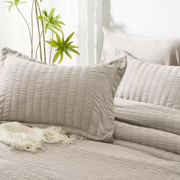imageCozyLux Queen Bed in a Bag White Seersucker Comforter Set with Sheets 7Pieces All Season Bedding Sets with Comforter Pillow Sham Flat Sheet Fitted Sheet and PillowcaseBeige