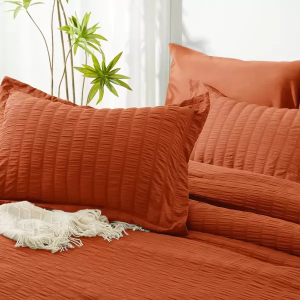 imageCozyLux Queen Bed in a Bag White Seersucker Comforter Set with Sheets 7Pieces All Season Bedding Sets with Comforter Pillow Sham Flat Sheet Fitted Sheet and PillowcaseBurnt Orange