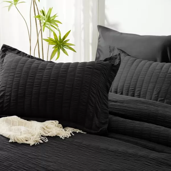 imageCozyLux Queen Bed in a Bag White Seersucker Comforter Set with Sheets 7Pieces All Season Bedding Sets with Comforter Pillow Sham Flat Sheet Fitted Sheet and PillowcaseBlack