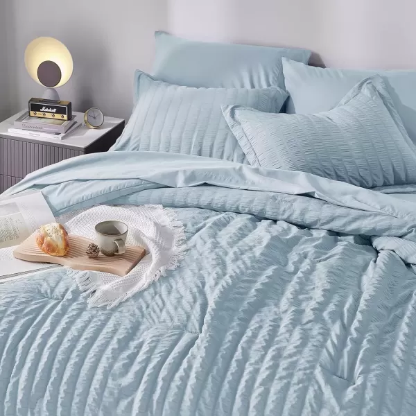imageCozyLux Queen Bed in a Bag White Seersucker Comforter Set with Sheets 7Pieces All Season Bedding Sets with Comforter Pillow Sham Flat Sheet Fitted Sheet and PillowcaseLight Blue