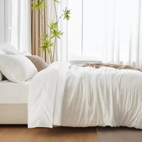 imageCozyLux Queen Bed in a Bag White Seersucker Comforter Set with Sheets 7Pieces All Season Bedding Sets with Comforter Pillow Sham Flat Sheet Fitted Sheet and PillowcaseIvory