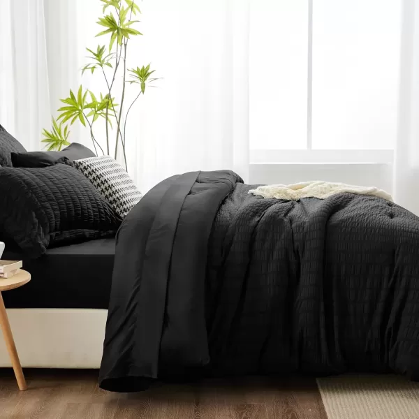 imageCozyLux Queen Bed in a Bag White Seersucker Comforter Set with Sheets 7Pieces All Season Bedding Sets with Comforter Pillow Sham Flat Sheet Fitted Sheet and PillowcaseBlack