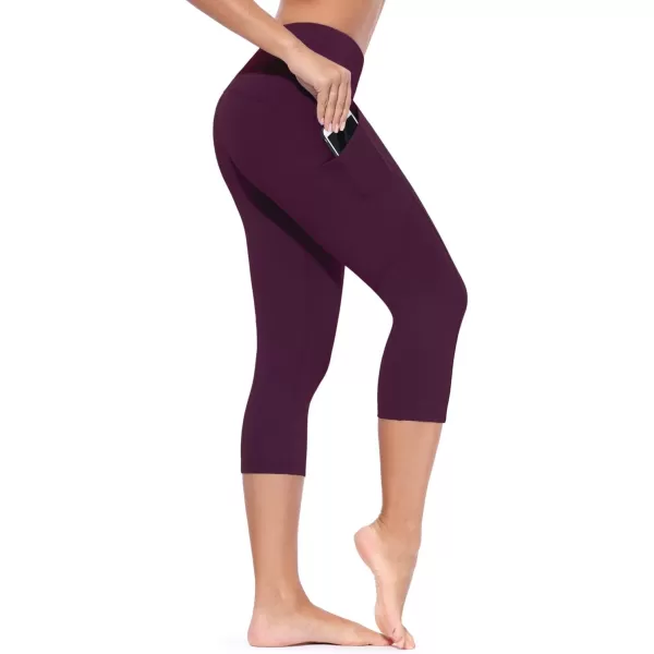 BALEAF Womens Yoga Pants Workout Capris Leggings Pockets Mid Waist Crop Athletic Running TightsDark Magenta