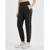 imagebaleaf Womens Fleece Lined Joggers Water Resistant Hiking Pants High Waisted Winter Thermal Sweatpants Zipper PocketsWhiteblack