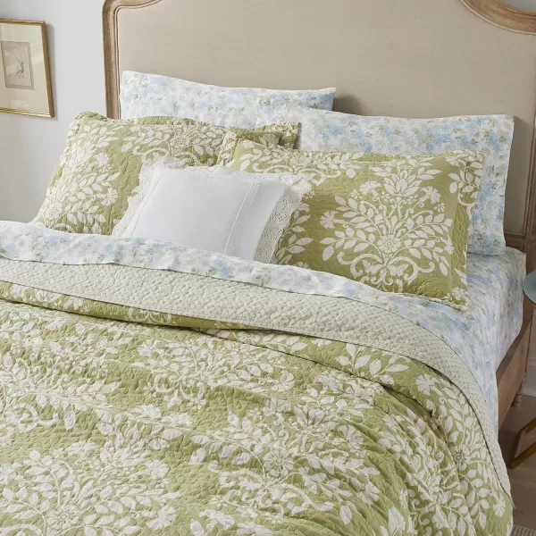 Laura Ashley Rowland Collection Quilt Set100 Cotton Reversible All Season Bedding with Matching Shams PreWashed for Added Comfort Twin SageLaura Ashley Rowland Collection Quilt Set100 Cotton Reversible All Season Bedding with Matching Shams PreWashed for Added Comfort Twin Sage