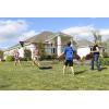 imageZume Games Portable Badminton Set with Freestanding Base  Sets Up on Any Surface in Seconds  No Tools or Stakes RequiredRedBlackGreen