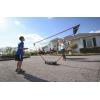 imageZume Games Portable Badminton Set with Freestanding Base  Sets Up on Any Surface in Seconds  No Tools or Stakes RequiredRedBlackGreen