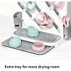imageOXO Tot Expandable Drying Rack  SpaceSaving Drying Rack  Newborn and Baby Essentials  Breastfeeding Essentials  Dry Baby Bottles  Save Space in KitchenExpandable